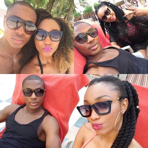 Odion and wife lounging at the beach