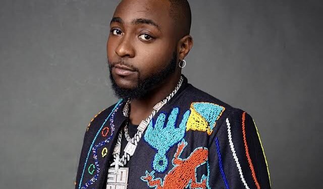 Davido angrily replies troll who wished for his death