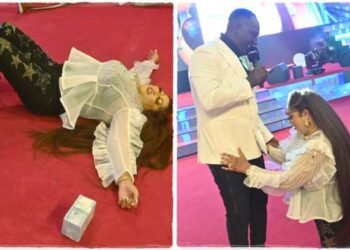 Prophet Jeremiah Omoto Fufeyin Splashes Bundles Of Naira Notes On His Wife