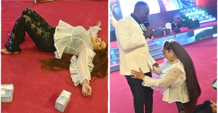 Prophet Jeremiah Omoto Fufeyin Splashes Bundles Of Naira Notes On His Wife