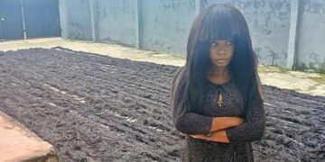 VIDEO: Nigeria’s Helen Williams Sets World Record For Longest Handmade Wig