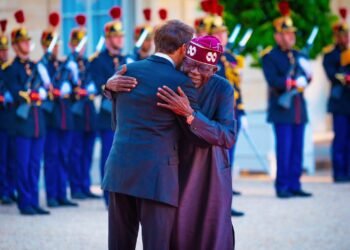 Macron, Tinubu Exchange Pleasantries In Pidgin, “E Sweet Me Well Well”