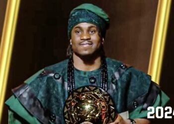 African Best Player Ademola Lookman Shares a Romantic Kiss with Mystery Lady