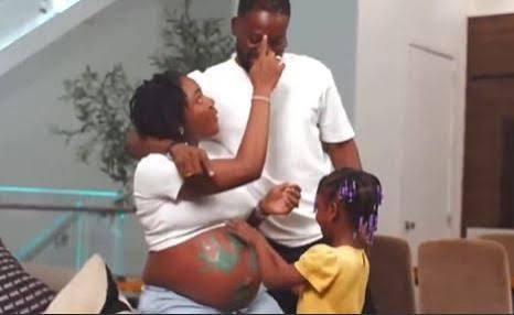 Simi Shows Off Baby Bump In Adekunle Gold’s Latest Music Video